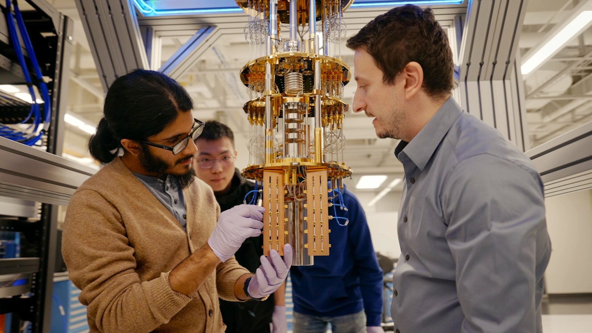 Members of Vrajitoarea Lab and their LD400 dilution refrigerator.