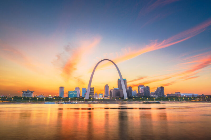 St. Louis, Missouri, USA downtown cityscape on the Mississippi River at twilight.
