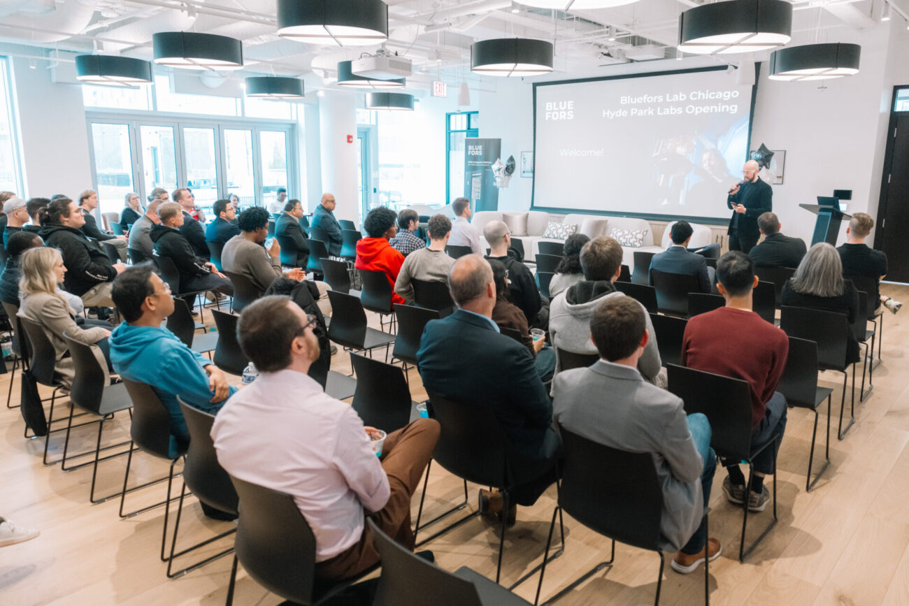Audience listening to a speaker at the Bluefors Lab Chicago opening event.