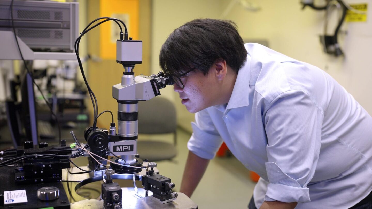 Student using a microsope