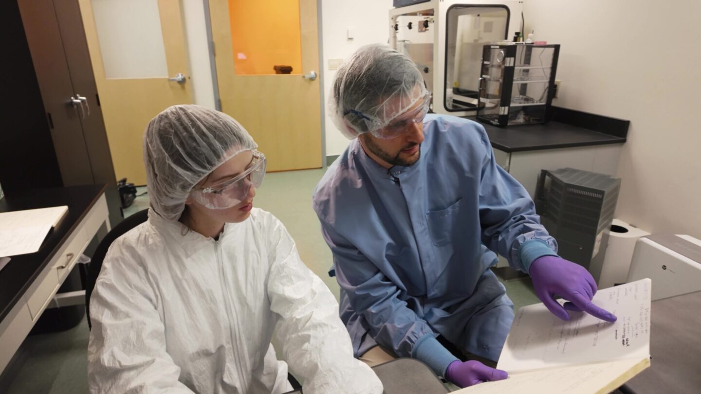 Student and professor at a nanofabrication facility
