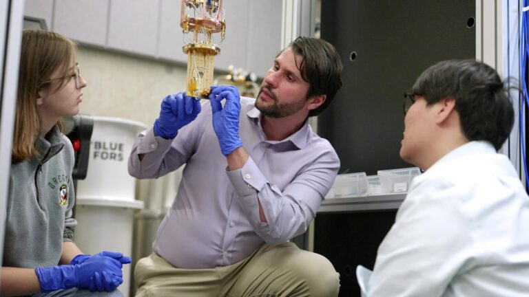 Research Assistant Professor Nik Zhelev teaching students of the Applied Physics Master’s Program.