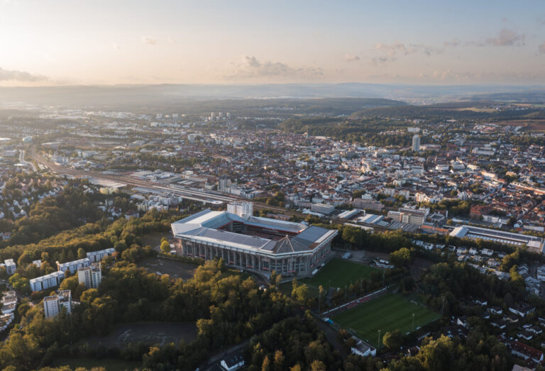 Aerial panoramic skyline cityscape of Kaiserslautern city and Fritz-Walter-Stadion, 1. FC Kaiserslautern stadium at sunset. Rhineland-palatinate, Germany
